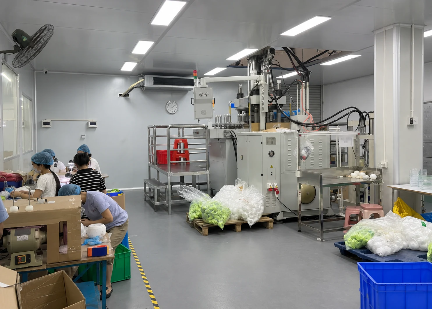 Liquid silicone production workshop with equipment and operators