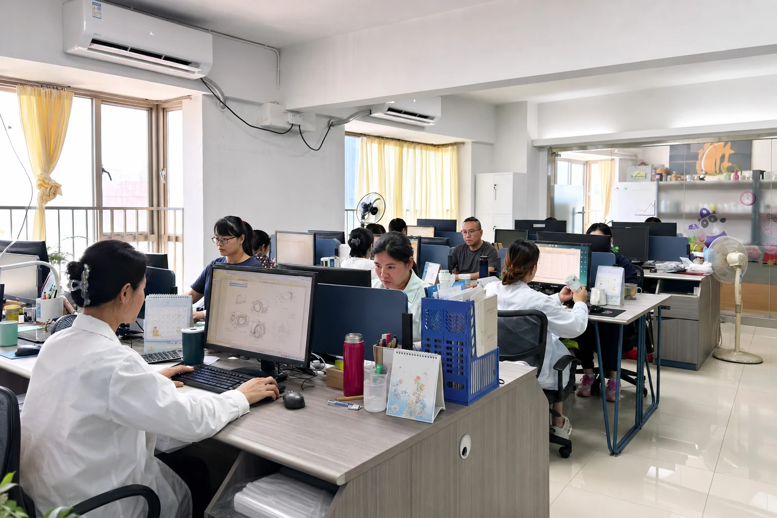 NANOSO sales and product development team reviewing customer projects
